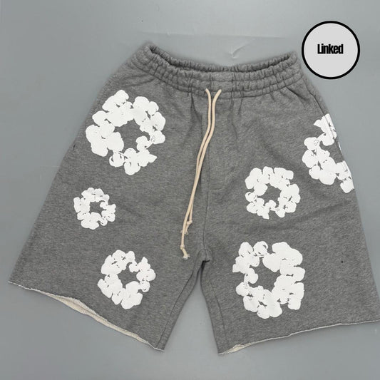 DENIM TEARS GREY SHORTS